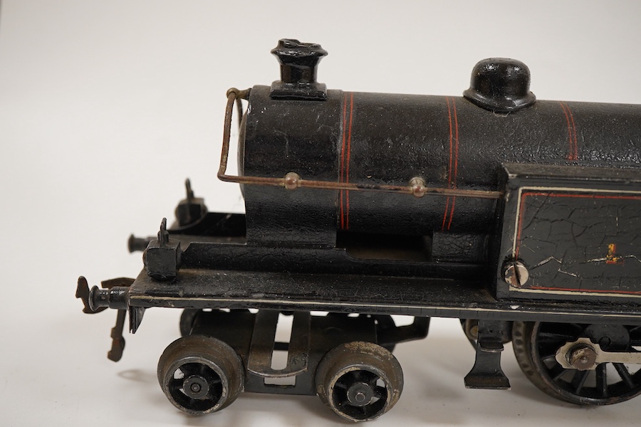 An 0 gauge Bing for Bassett-Lowke tinplate clockwork LNWR 4-4-0T locomotive, 3611, with original clockwork mechanism